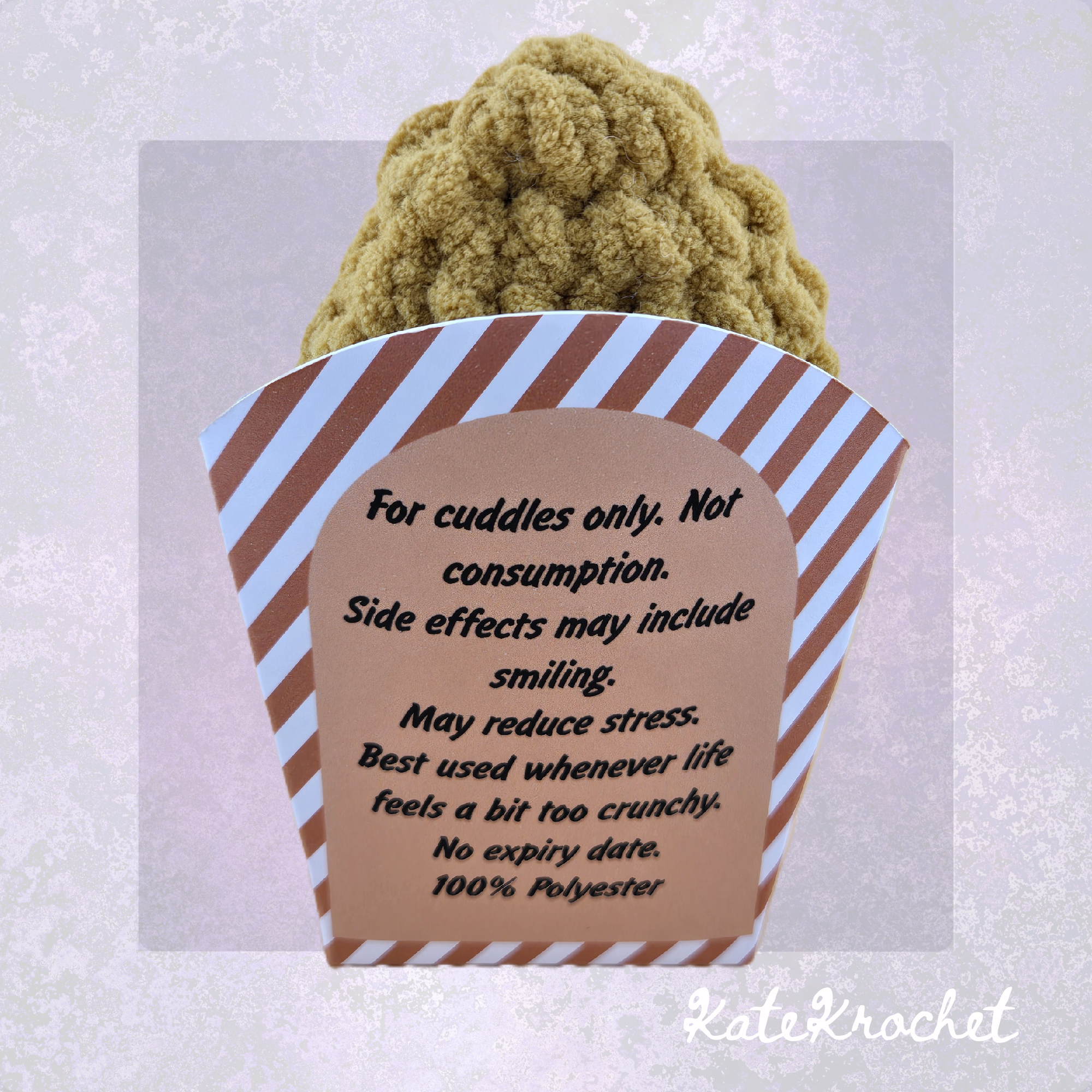 Back of handmade Emotional Support Nugget fry box with humorous cuddle and care message by KateKrochet