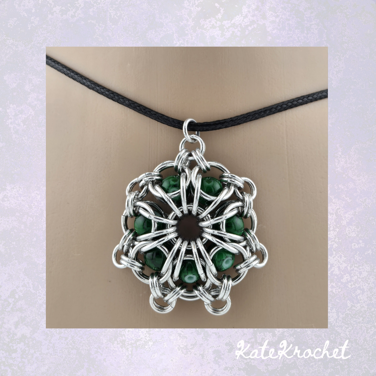 Close up of a Chainmaille Captured Bead Flower Pendant Necklace in Dark Green by KateKrochet