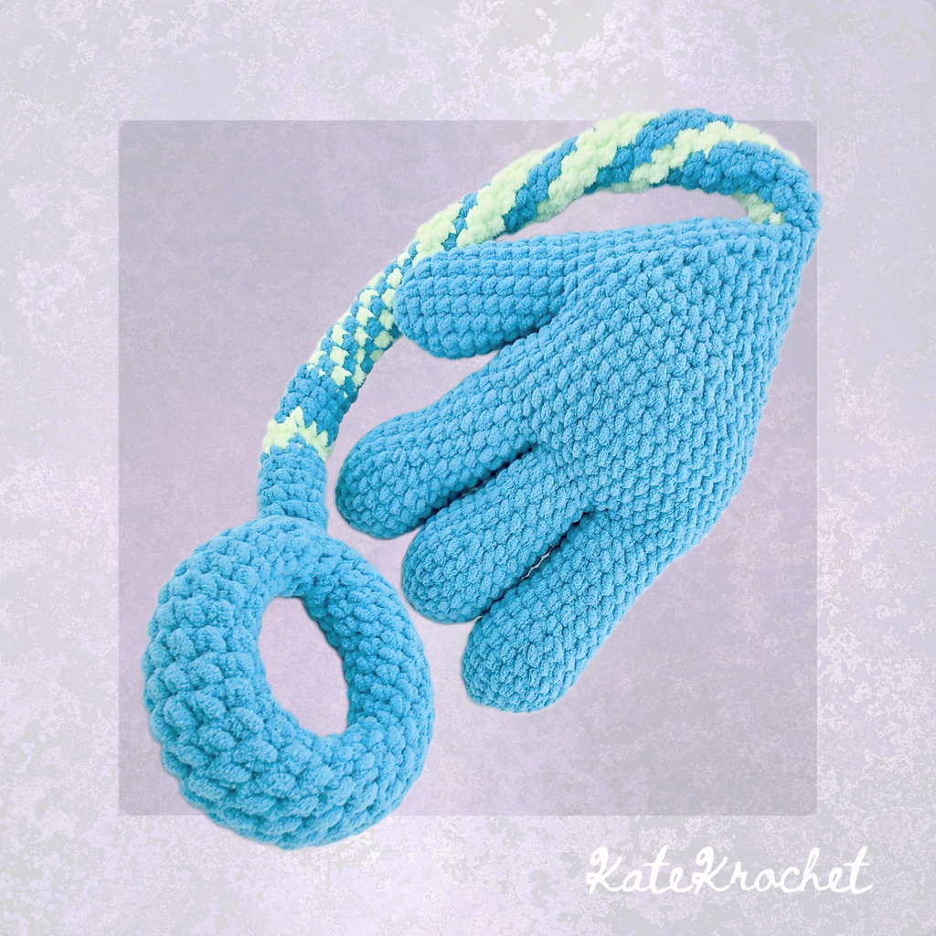 A Handmade Crocheted Giant Slappy Hand in Light Blue and Bright Green Colours made by KateKrochet
